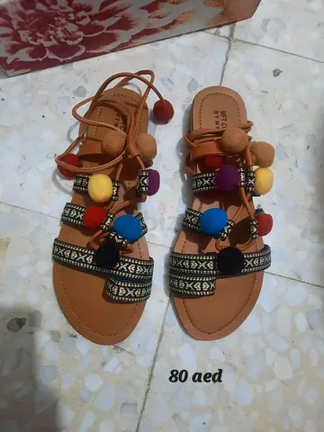 Lace up pom pom Sandals