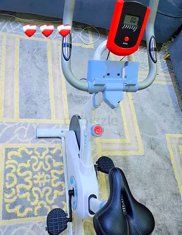 Used Upright Exercise Bike with Digital Monitor and Comfortable Saddle