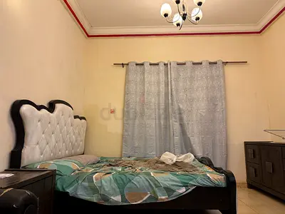 Kerala Family Sharing Master Bedroom Near Dubai Border