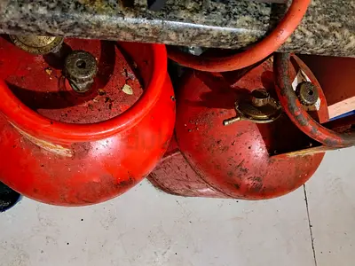 Two Red LPG Gas Cylinders - Used, Working Condition