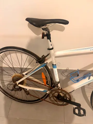 Used white road bike — needs repair (rusty chain  gears)