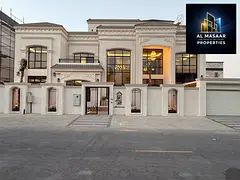 Own your luxurious two-story villa in Ajman with a rooftop terrace, an indoor pool, air conditioning