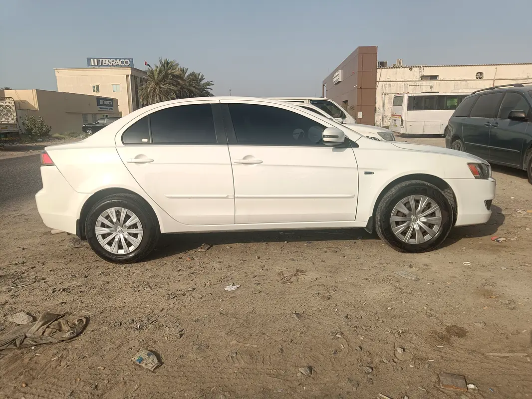 Mitsubishi Lancer EX 2015 — photo 1 of 5