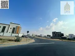 CORNER Residential investment land with villas in Ajman, Al Tilla 2 area. The land covers an area of