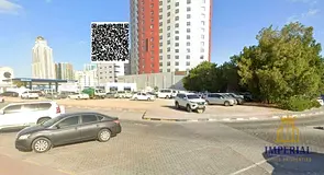 Residential and commercial plot on the corner of two streets on Sheikh Khalifa bin Zayed Street in A