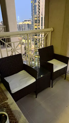 Outdoor rattan balcony set — 2 chairs + side table (good condition)