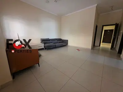 The largest apartment with a living room for annual rent in Al-Rawda area: 2 bedrooms, laundry room, central air conditioning, spacious, 2 bathrooms,