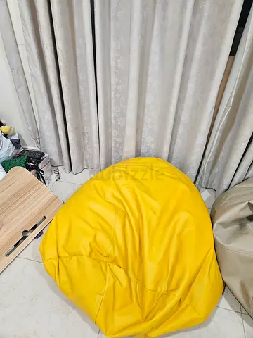 Comfortable yellow bean bag chair - good condition