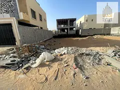 Residential land for sale in Ajman Al Yasmeen area, close to the park, all services, and sho