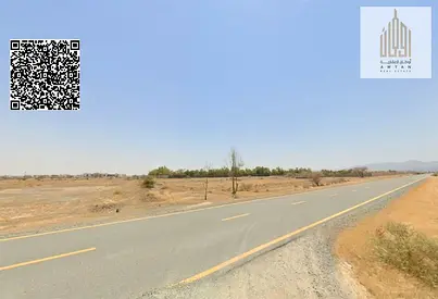 Land for sale in Manama 13, corner lot, in a prime location