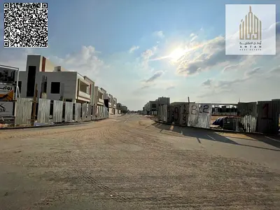 Residential investment land for sale in Al Bahia, Ajman, at a special price. The land is located within the Al Bahia Hills project. The land area is