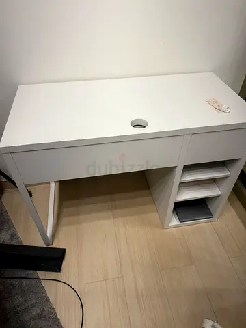 White study desk with built-in storage shelves