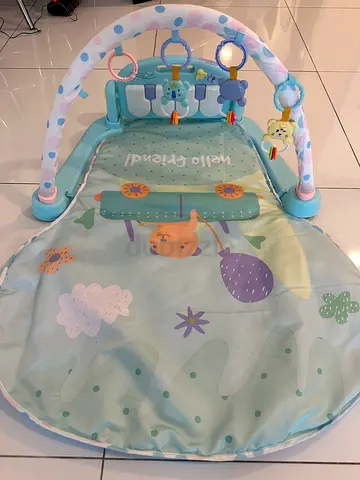 Baby activity play mat with hanging toys - light green, good condition