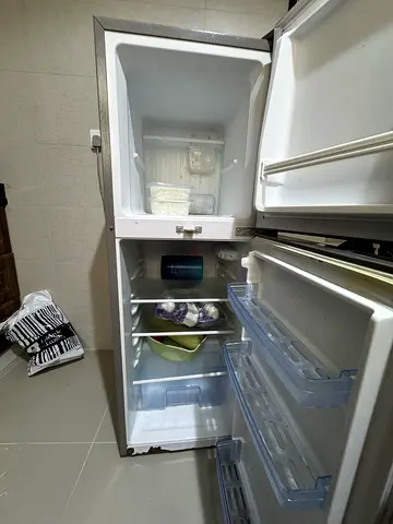 Compact size Used double-door refrigerator - bottom freezer, good condition at throw away price-