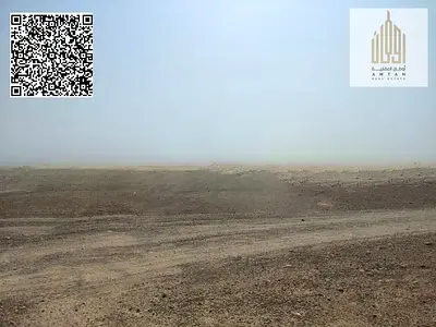 Two adjacent plots of land for sale in Masfout, Block 11
