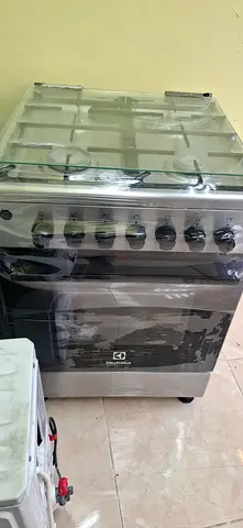 Stainless Steel 4-Burner Gas Stove with Oven - Good Condition