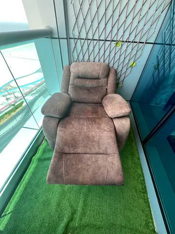Electric brown reclining armchair - good condition
