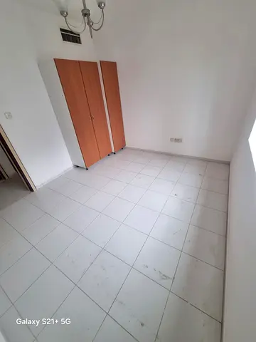 For rent in Sharjah Al Taawun spacious apartment two bedrooms and hall with large distribution area