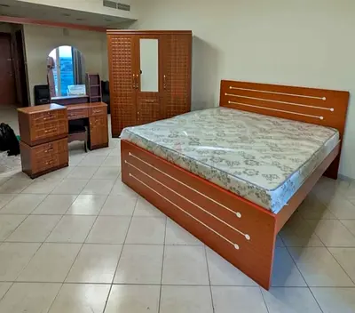 We are selling wood Bedroom set brand new available