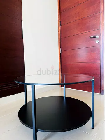 Round Black Glass Coffee Table with a Shelf