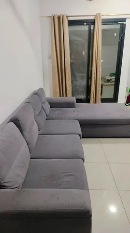 L-shaped grey fabric sectional sofa with chaise - good condition