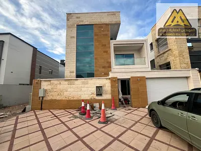 Al Yasmeen, Ajman, featuring a modern design and high-quality finishing, ideal for families seeking spacious and comfortable living. The villa consist