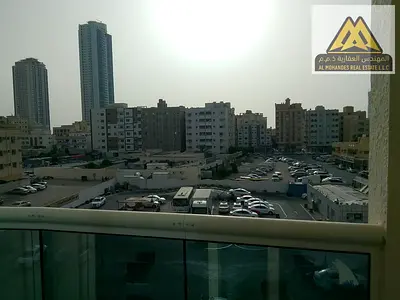 1BR apartment Al Nakheel 1 Al Karama street 2nd row Corniche separate hall balcony parking 27K yearly 4 or 6 payments close to services ready to move