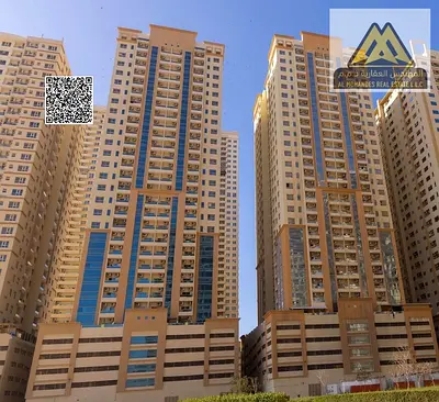 فرصة استثمارية مميزة في أبراج الإمارات – شقة غرفة وصالة مؤجرة مع باركن وطابق مرتفع وعائد إيجاري جاهز