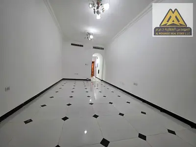 Studio apartment for annual rent | Al Rawda 3 | High-end finishing | Spacious area | On the Dubai and Sharjah exit | In the heart of all services