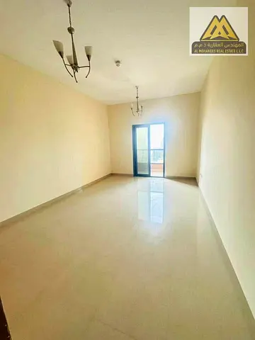 The unit features a modern American-style kitchen, an open-view balcony, and excellent finishing in a prime location close to all daily services.