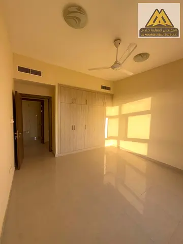 High-End 3BR Family Apartment For Rent In Al Mowaihat 2 Ajman Directly On Sheikh Ammar Street Ultra Spacious Layout Featuring 3 Bathrooms, Large Livin