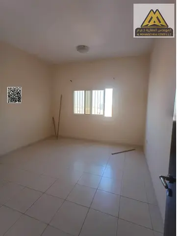 3 bedroom hall in Liwara 1, Ajman, 3 bathrooms, balcony, central AC, AED 50k, 4 payments, prime location.