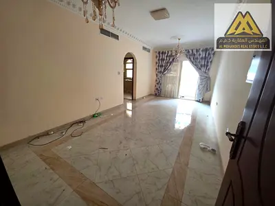 Two bedrooms (including a master bedroom), spacious living room, bathrooms, balcony