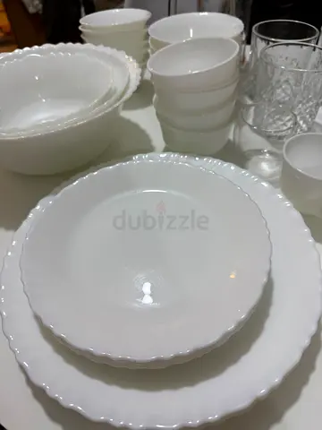 White ceramic dinnerware set - plates, bowls and cups