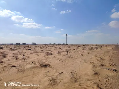 **Prime Mixed-Use Land for Sale in Al Sahmah | Strategic Location | Outstanding Investment Opportunity**