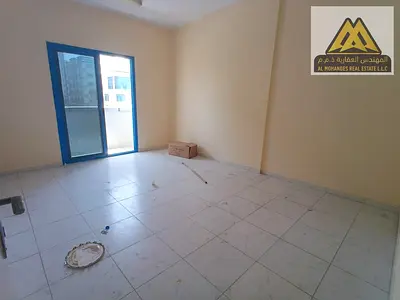 Spacious 1 Bedroom apartment with living room in a prime and convenient location in Al Hamidiya