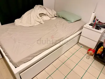White single bed frame with under-bed drawers
