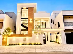 Modern 6-bedroom villa with a roof terrace for sale in Al Bahia area. Super deluxe finishing, freeho