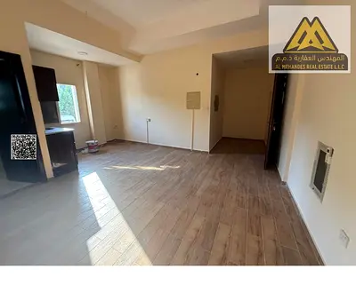 Studio in Al Mowaihat 1, new building, second tenant, split AC, ground floor, near Sharooq Mall, 20k AED, 4 payments.