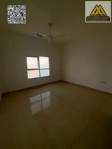 Studio for Annual Rent in Al Muwaihat 3 – Ajman | Semi-Closed Kitchen | Central AC | Prime Location