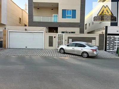5 master bedrooms. 6 bathrooms. Maid's room. 3600 square feet.