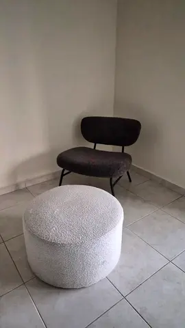 Modern lounge chair with round bouclé ottoman - good condition