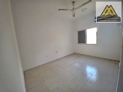 Cheapest price in Ajman, in Al Nuaimiya: 2 bedrooms and a living room, suitable size, separate lounge, split air conditioning
