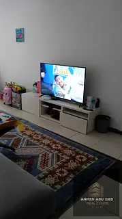 Monthly furnished 1BR near Grand Mall, spacious, balcony view, central AC, equipped kitchen, free pa