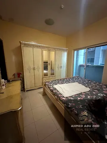 Two bedrooms and a living room for annual rent, furnished, in Ajman, City Towers, Al Nuaimiya 3, Kh