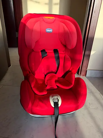 Infant car seat base (part shown) - used