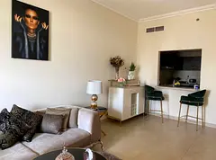 To share with 1 female ; spacious 1 bedroom apartment in JVC