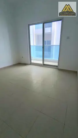 The apartment features a balcony, two bathrooms, a master bedroom, central AC, and free maintenance, offering comfortable and convenient living.