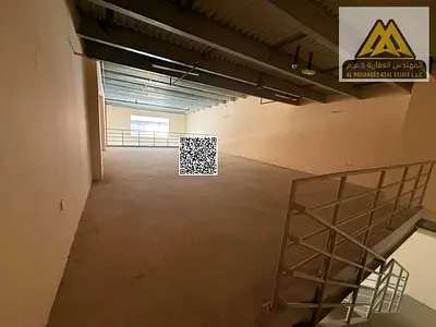 a mezzanine-level warehouse with ample space in a vibrant industrial area, providing an ideal environment for operations, storage, and business growth