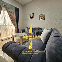 Beautiful furnished one-bedroom apartment with new furniture for monthly rent in Ajman - Corniche -